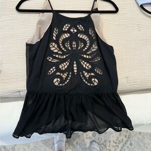 Black Sleeveless Top with Intricate Design